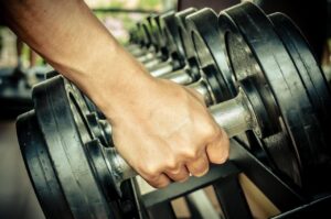 Heavy Dumbbell in Gym Wall Mural